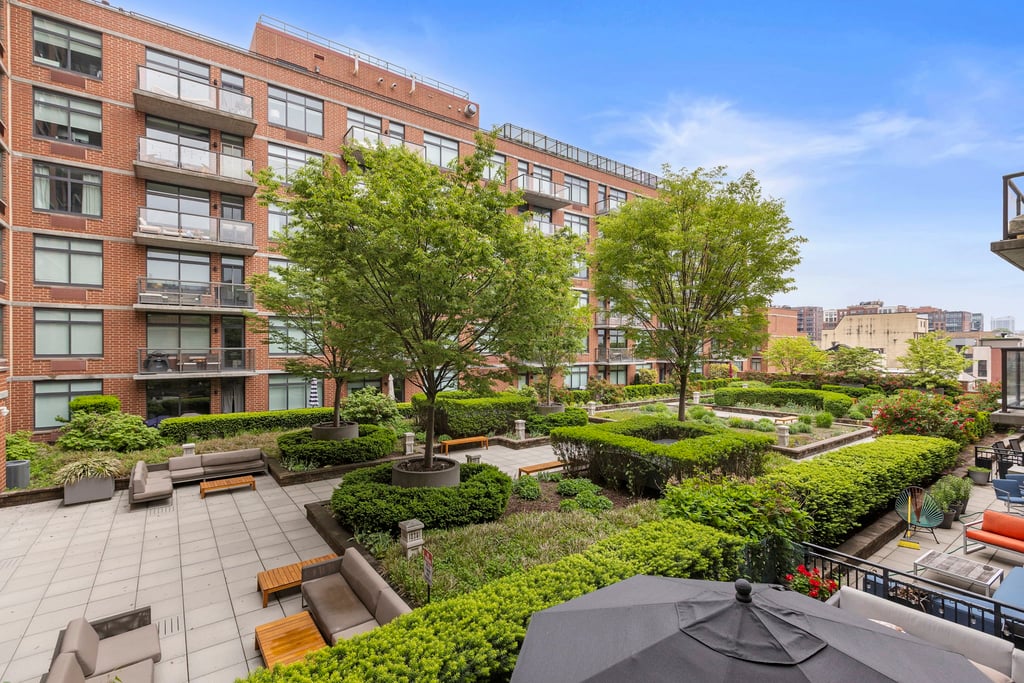 1400 Hudson Street Guide: Uptown Hoboken Waterfront Condos 2 Landscaped courtyard with paths and seating at 1400 Hudson Street, Hoboken
